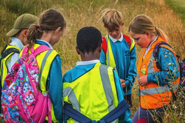 School children enjoying a trip to the South Downs